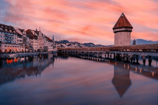 Chapel Bridge and water tower in Lucerne at sunset