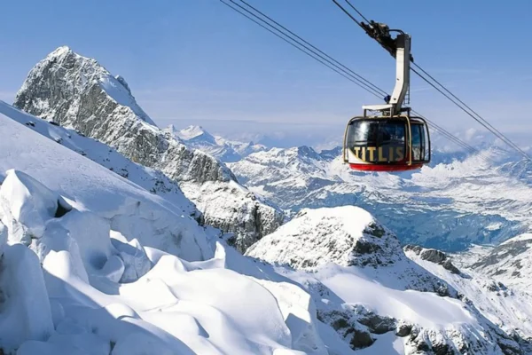 Rotair cable car above the snowy slopes of Mount Titlis, Switzerland